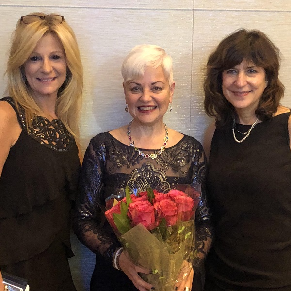 Newly inducted Fellow of the American Academy of Nursing Bobbie Posmontier PhD, CNM, PMHNP-BC, a associate professor in graduate nursing with Kymberlee Montgomery, DNP, APRN, WHNP-BC, CNE, FAANP, FAAN, chair of the Department of Advanced Practice Nursing, and Laura N. Gitlin, dean and distinguished University professor